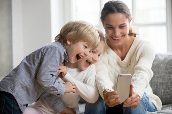 Smiling Mother Taking Selfie With Cute Kids On Smartphone, Happy Boxies